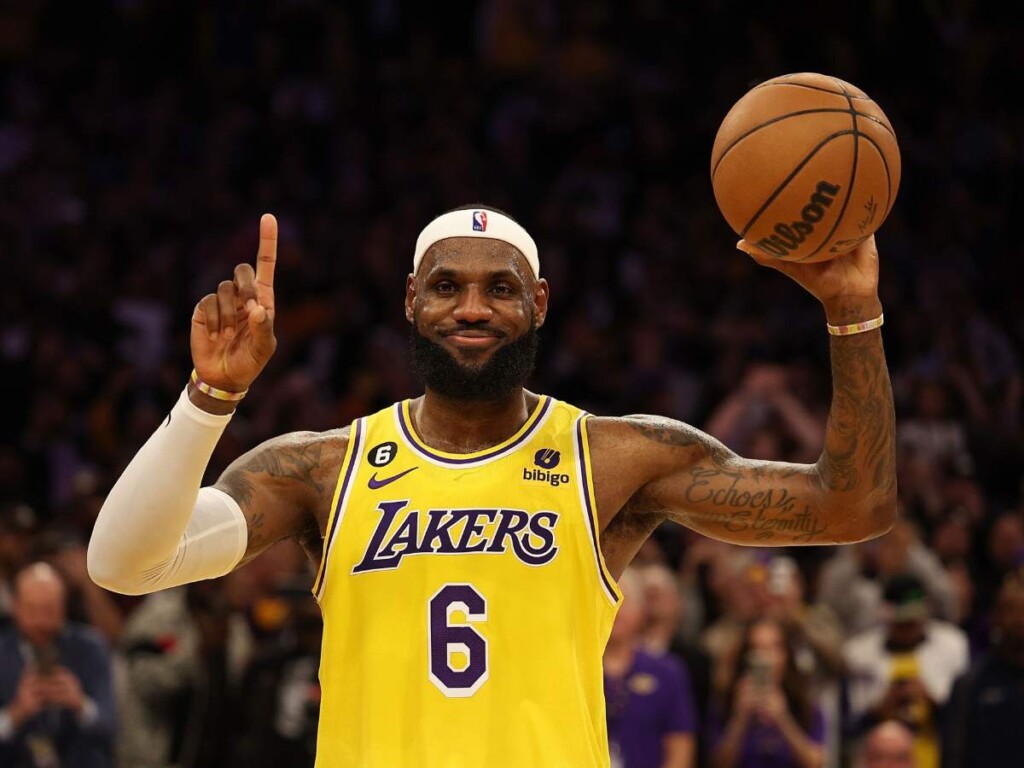 LeBron James smiling after a win (Image via Harry How/Getty Images)