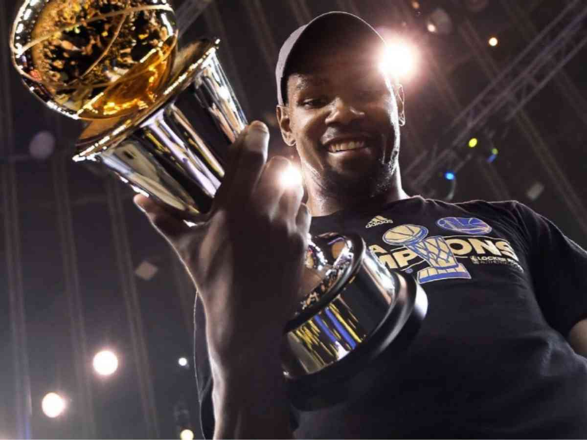 Kevin Durant with his finals MVP award