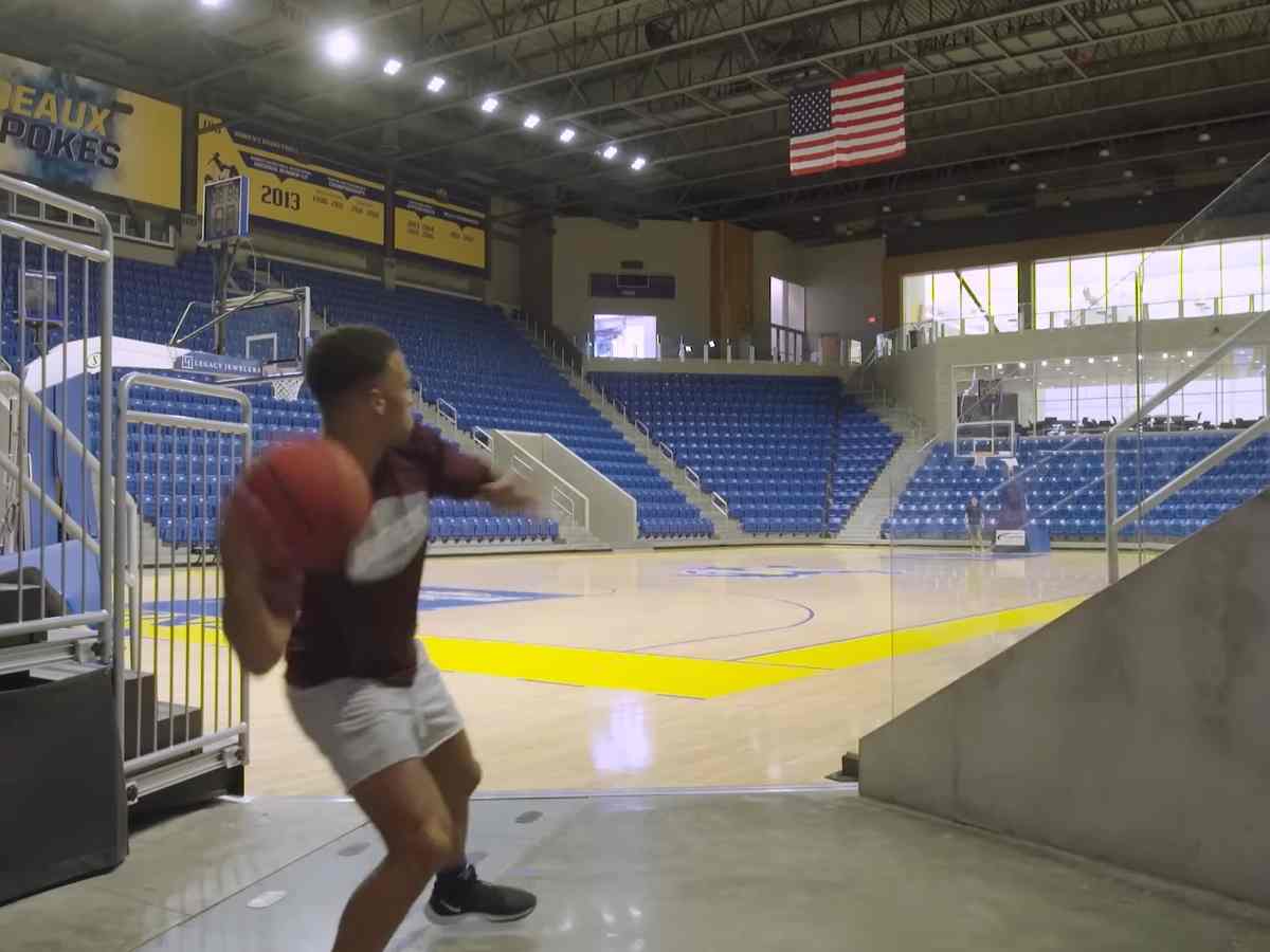 Joshua Walker holds the Guinness World Record for the longest basketball shot at 113 ft 6 in