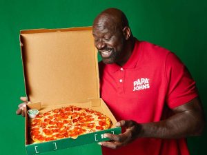 Shaq with the 'Shaq-a-roni' pizza (Papa John's)