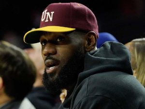 Tom Brady's ex-teammate unnecessarily shares forged image of LeBron James with two women after he was spotted sitting between Jeanie Buss and Linda Rambis during Lakers game