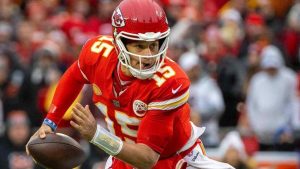 Kansas City Chiefs quarterback Patrick Mahomes (15) scrambles against the Cincinnati Bengals on Dec. 31, 2023, at GEHA Field at Arrowhead Stadium in Kansas City, Missouri.