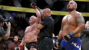 Brock Lesnar gets his hand raised against Mark Hunt at UFC 200