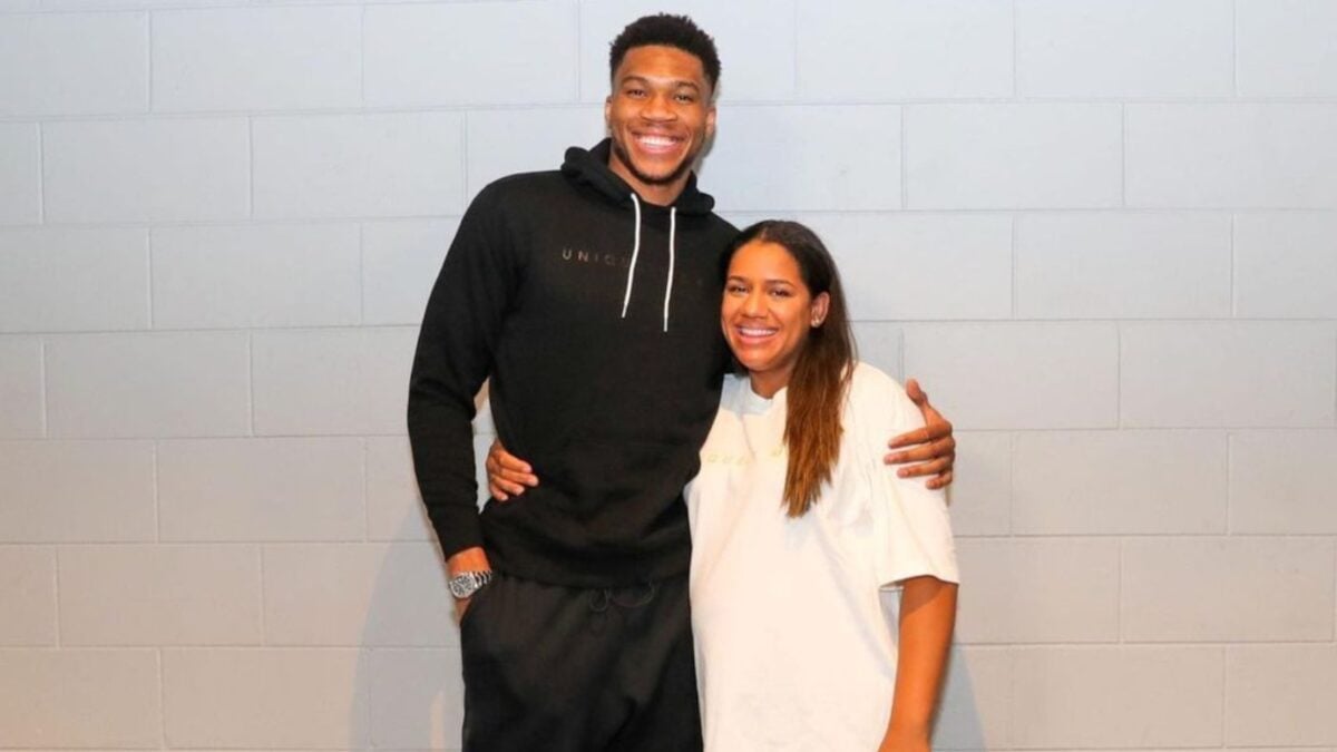 Giannis Antetokounmpo and Mariah Riddlesprigger sporting her apparel collection