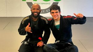 Demetrious Johnson with Mikey Musumeci