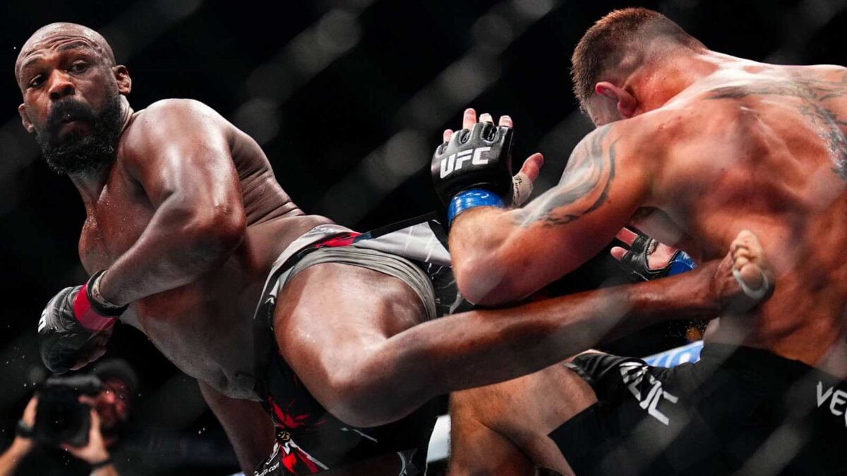 Jon Jones landing a spinning back-kick on Stipe Miocic