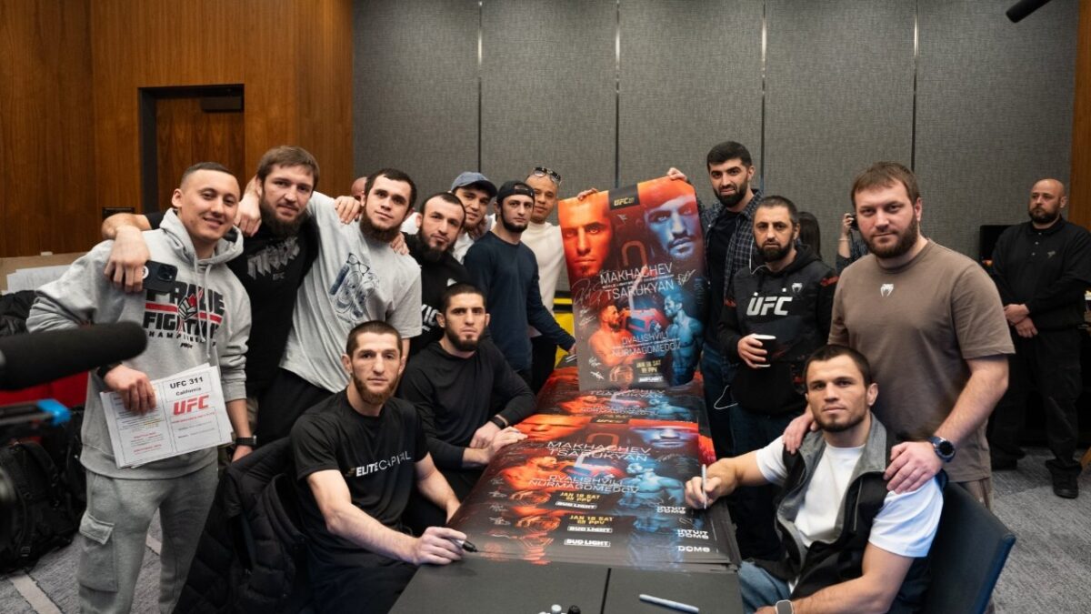 Islam Makhachev posing with his family and friends before his UFC 311 fight